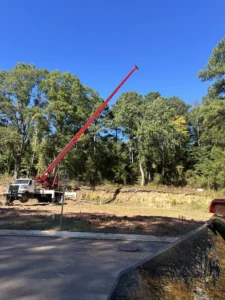 We utilized a crane to safely remove these trees.
